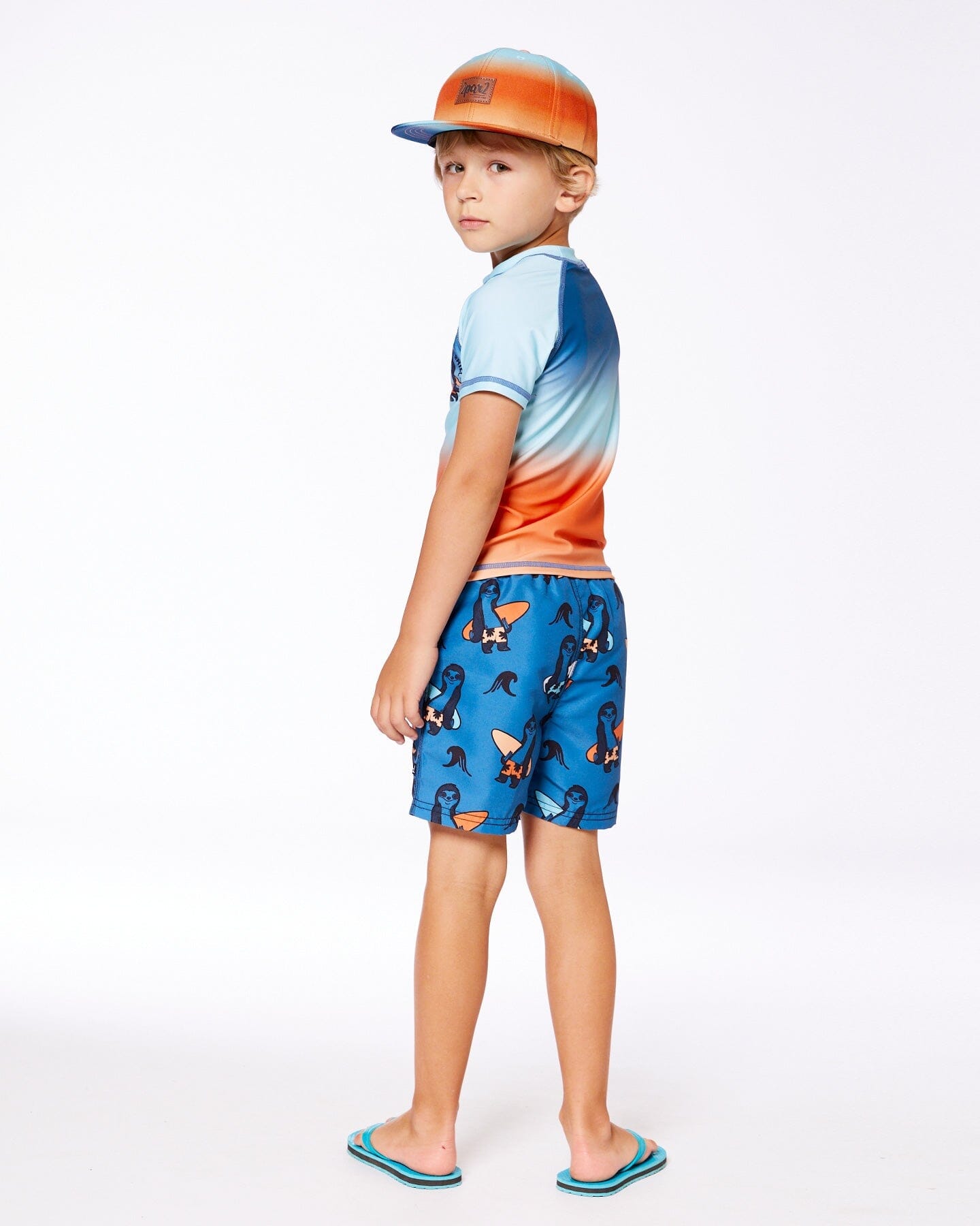 Printed Swim Trunks Orange Sloths On Navy Blue