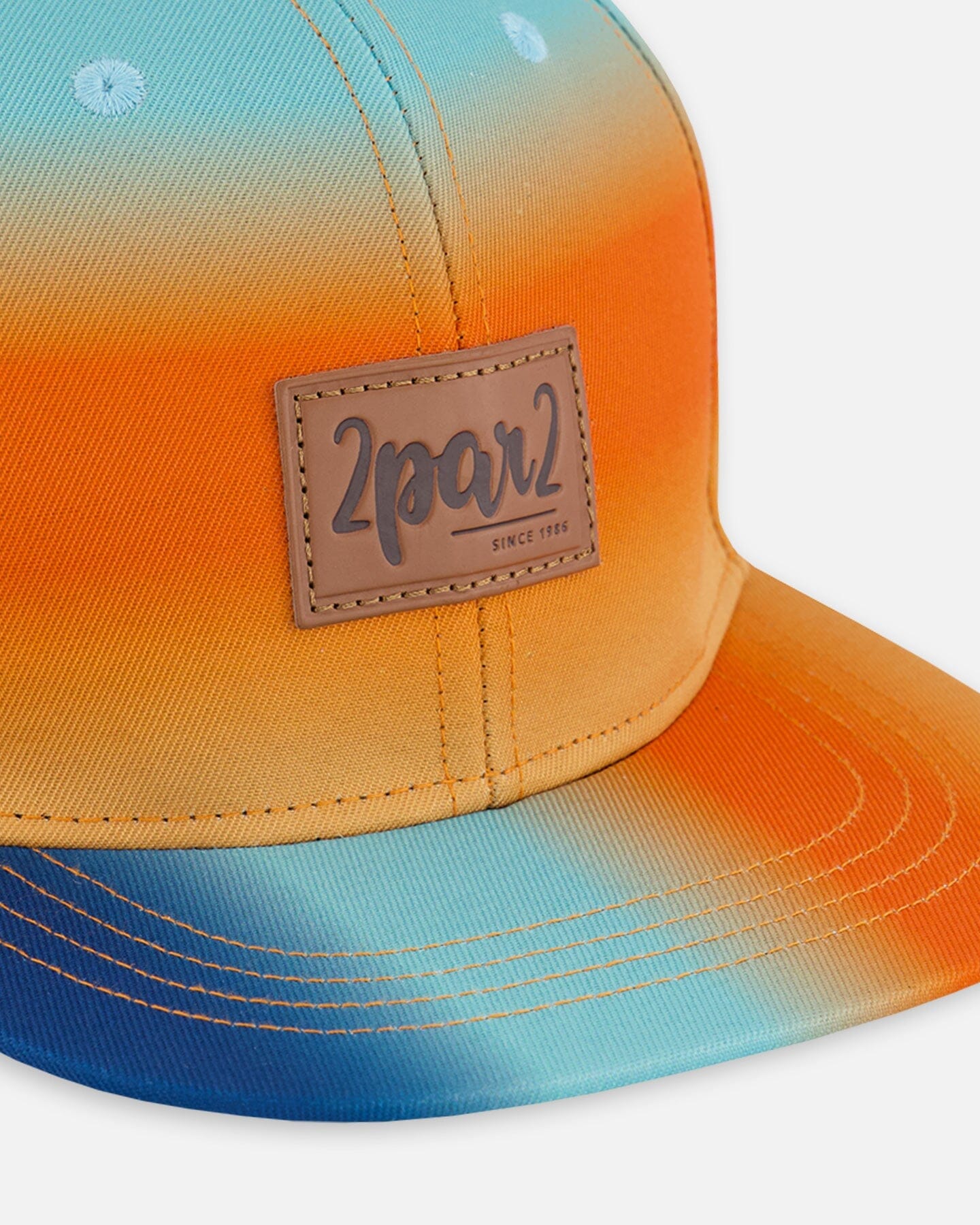 Printed Cap Navy Blue, Turquoise, And Orange